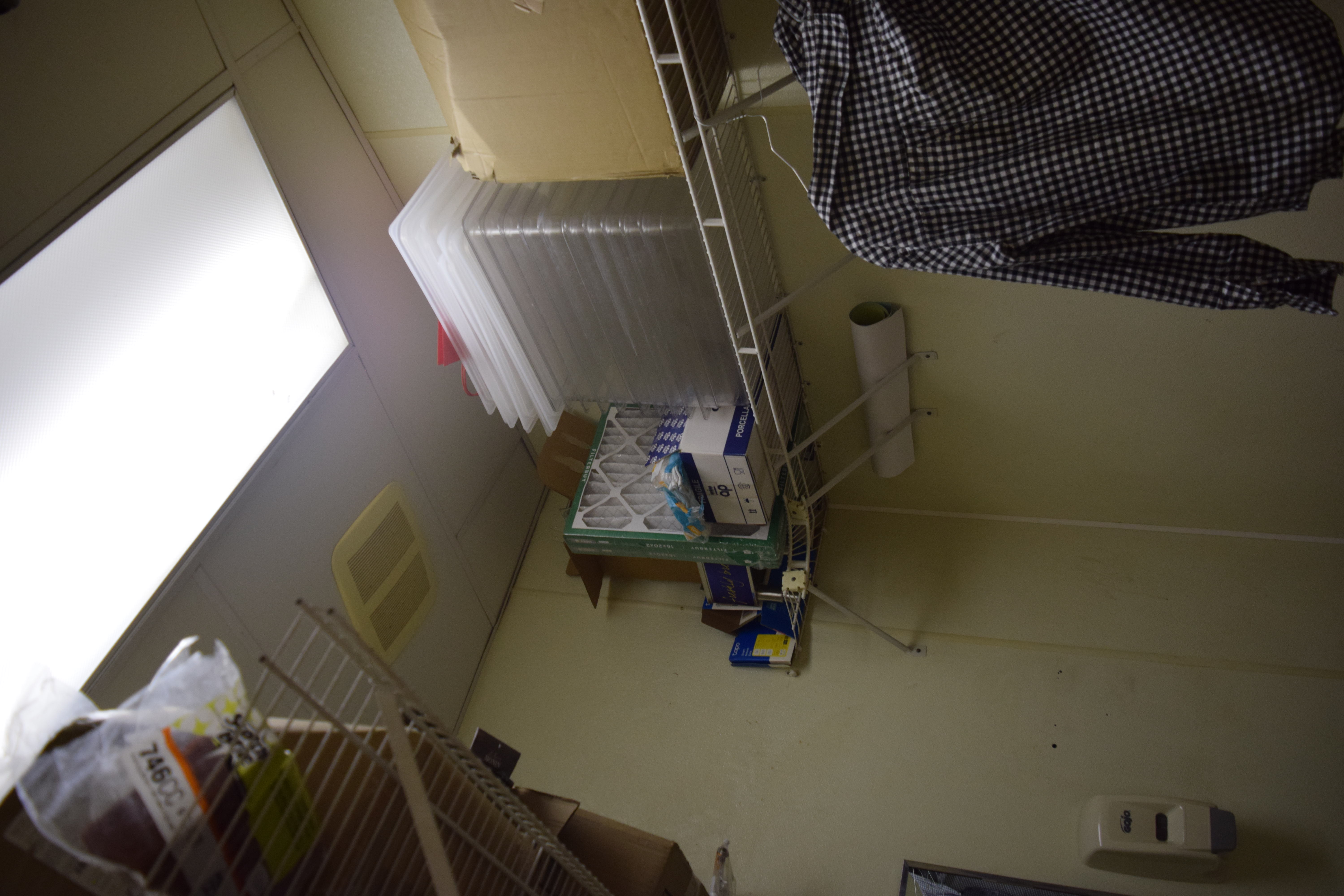 Air-vent and shelving area — unsanitary storage conditions documented