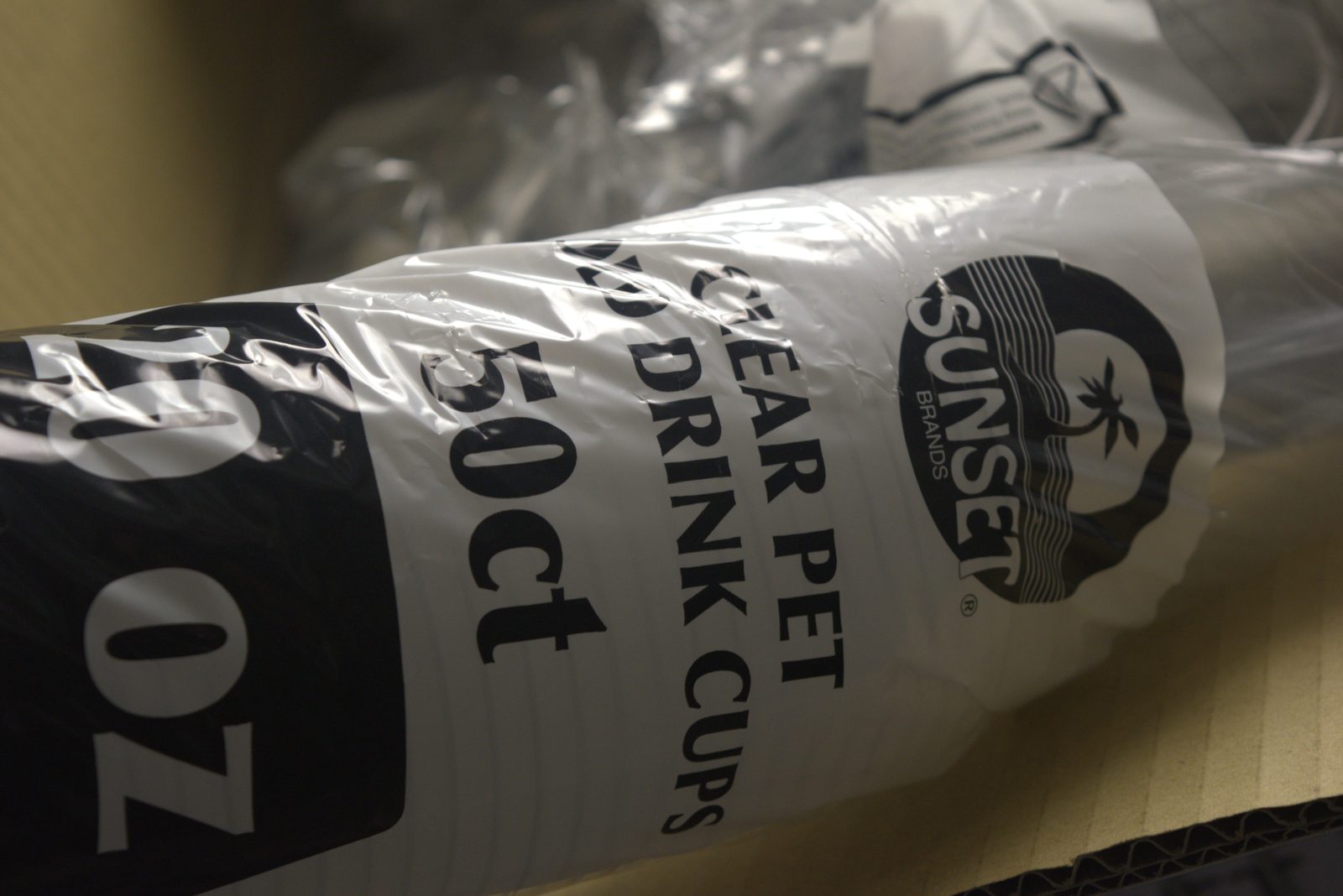 'Sunset Brands CLEAR PET COLD DRINK CUPS' — generic foodservice supplier brand, not the Qargo-spec branded cup