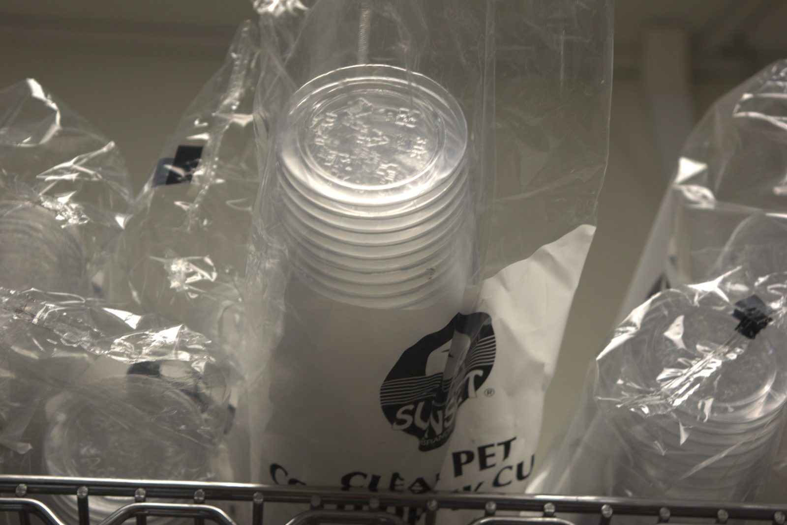 Sunset Brands cup sleeve open and stored unsealed — exposed cup rims left uncovered (lip-contact contamination risk)